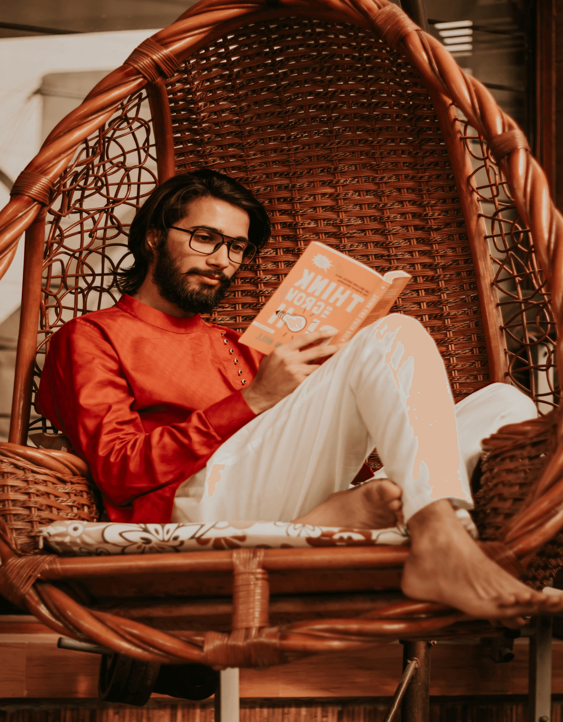 Reader enjoying a book in a comfortable chair